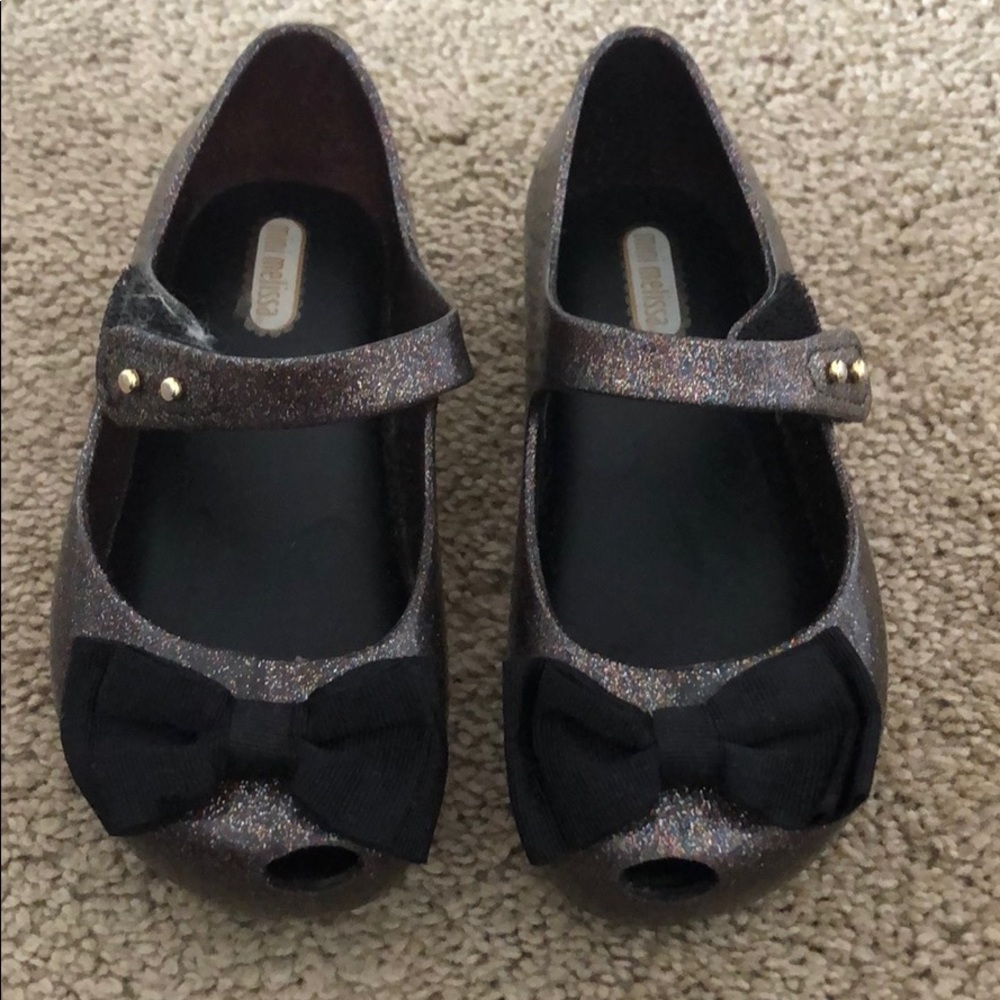Black sparkle mini Melissa size 10